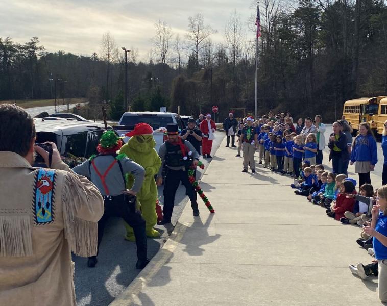 Grinch being Arested at Lake Lure Classical Academy