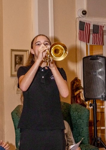 Zoey Harper Plays Taps