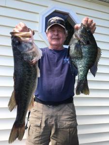 Gary Hasenfus with two fish