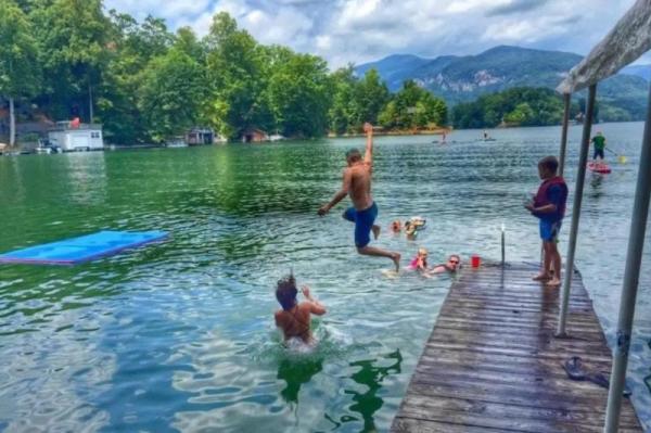 Kids jumping in the lake