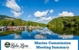 Photo of marina with Marine Commission Meeting Summary sign