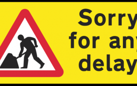 Road delay sign