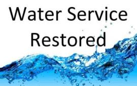 Water Service restored sign
