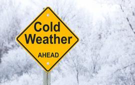 Cold Weather Ahead Sign. Rested by James Brey - Credit Getty Images