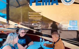 Brien and Kathie Hatfield with FEMA Representative