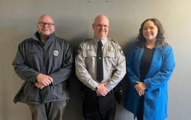 Chief Sean Humphries, Corporal Tyler Dills and Lake Lure Town Manager Olivia Stewman