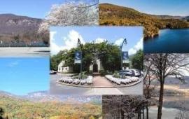 Lake Lure in all four seasons with Town Hall in the Center