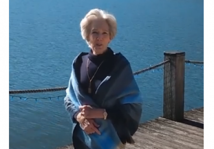 Mayor Carol Pritchett standing in front of the water