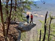 Volunteers Bob Carlson and Kim Chao on Youngs Mountain Trail