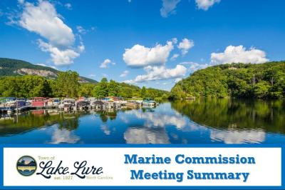 Photo of marina with Marine Commission Meeting Summary sign