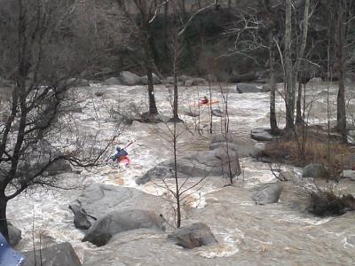 Kayaks On Swollen Rocky Broad