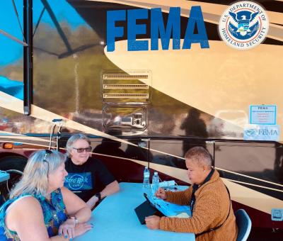 Brien and Kathie Hatfield with FEMA Representative