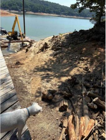 Barge Removing Debris and Silt