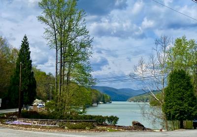 Welcome to Lake Lure Sign with Lake in Background
