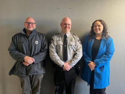 Chief Sean Humphries, Corporal Tyler Dills and Lake Lure Town Manager Olivia Stewman