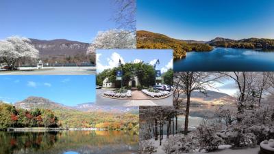Lake Lure in all four seasons with Town Hall in the Center