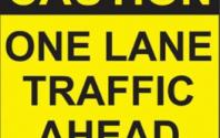 Caution - one lane road sign